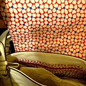 Brand new with tags still on from Ross. Off white shoulder purse.